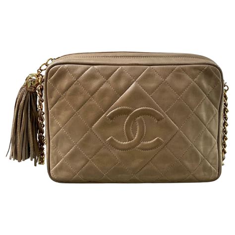 chanel vintage camera bag beige.